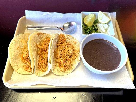 Three Pollo (Chicken) Tacos with a Side of Black Beans