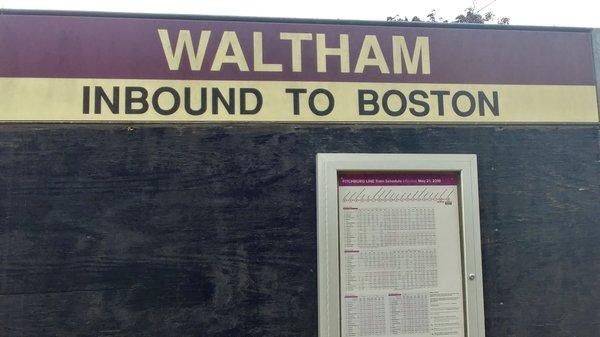 Sign and schedule at Waltham Station