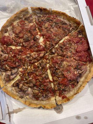 Supposed to be uncut, Chicago classic that has extra sauce.  It has hardly any sauce, cut and been sitting around before delivered