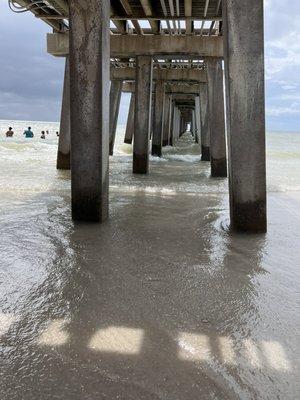 Under pier... part of pier is damaged further out.. so you can't walk it.