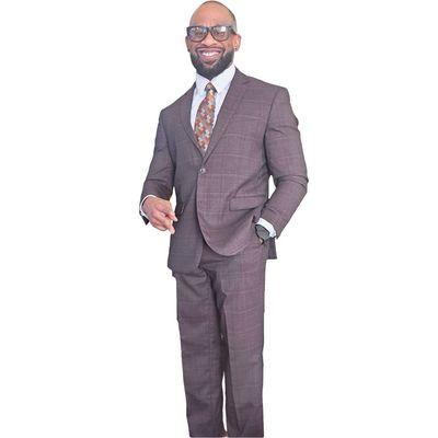 Burgundy with stripes suit, matching tie, and Mason Blue dress shirt.