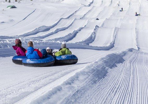 Cruising down the Frisco Adventure Park Tubing Hill- Cr. Todd Powell