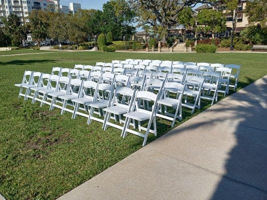 White Resin Chairs set up at the Casement in Ormond Beach.