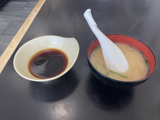 Tempura sauce (left) and miso soup (right.)