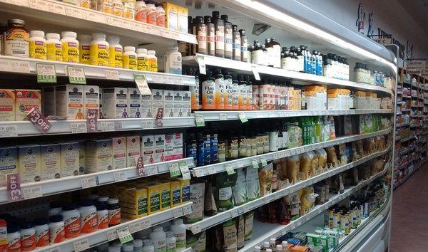 The supplements part of the store includes a large refrigerated section for temperature-sensitive items.