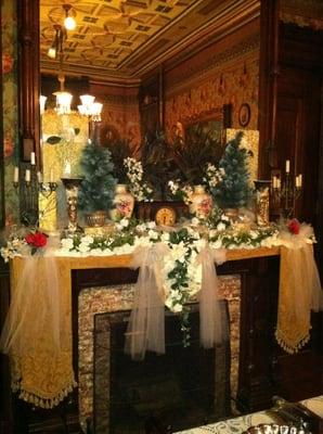 The fireplace mantle in the dining room.