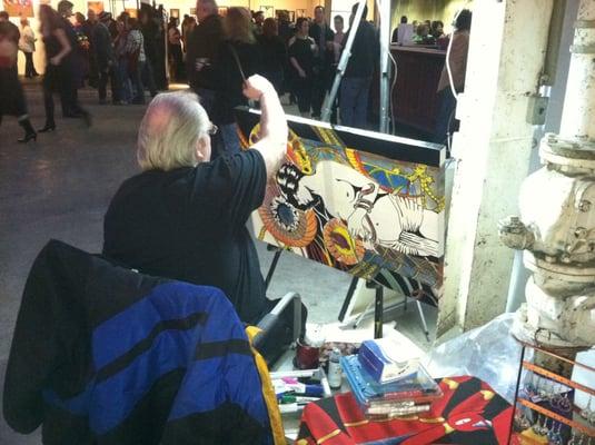 Artist painting live at Naughti Gras!