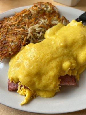 Classic eggs Benedict with scrambled eggs