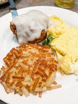 Chicken fried chicken, hash browns, and eggs