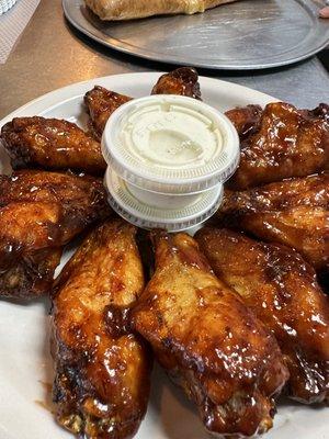 Get a half or full dozen of crispy fried bone-in wings and drummies tossed in your choice of sauce: Buffalo, BBQ, Sweet Chili or Garlic Parm