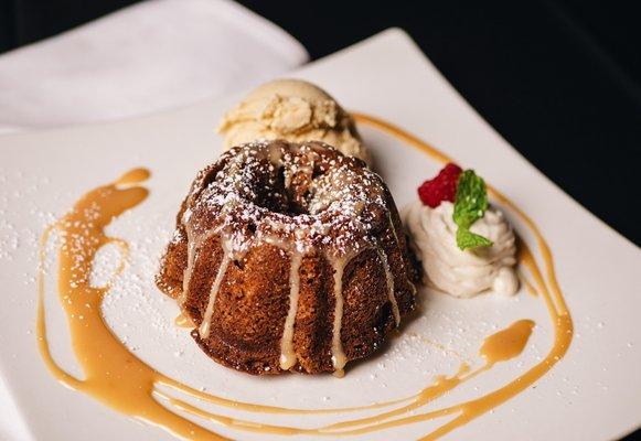 Apple Spice Cake served with eggnog ice cream and Dulce de Leche sauce