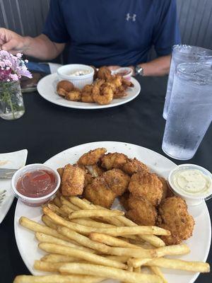 Shrimp dinner with 10 shrimp at top.  Fish and chips in front of