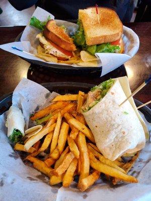 Tuna melt and chicken Cesar wrap with hand cut fries.