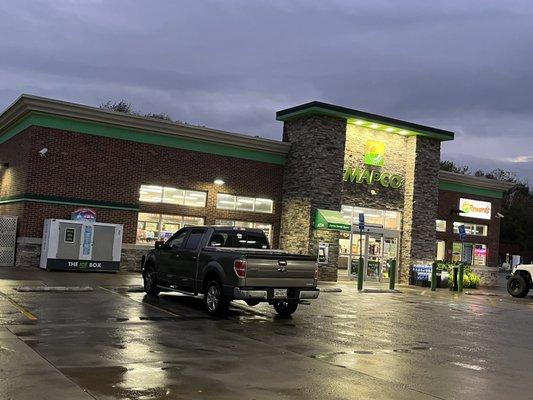 Front of convenience store, well lit & clean