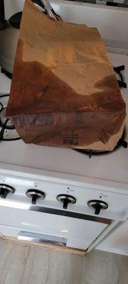 Grease soaked food bag.