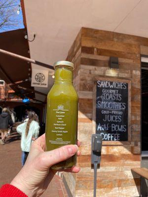 Bottled "The Lawn"--cucumber, kale, spinach, rainbow chard, Granny Smith, red pepper and lemon.