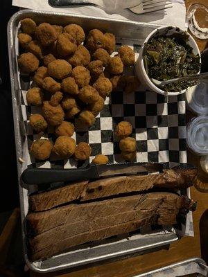 Sliced brisket, fried okra and collard greens