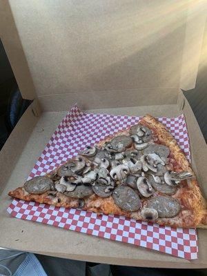 Single slice with mushrooms and sausage