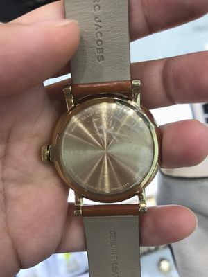 My watch with scratches (check out the dent on the upper right side). *Please read my review though