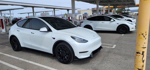 Rows of Tesla chargers