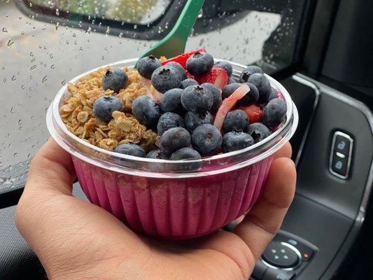 Pitaya Bless Bowl with granola, blueberry, and strawberries.