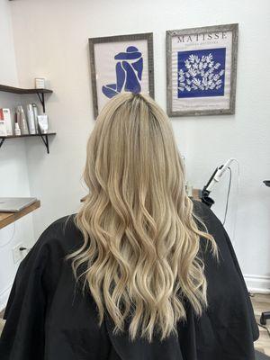 Warm Sandy Blonde with a little Dark Root for a lesser maintenance look