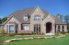 In This home, south West Stone features our 31st Street Blend natural thin stone complimented with decorative boulders.