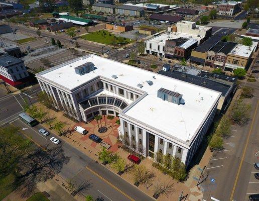 Roof Restoration: Silicone fluid applied roof membrane resurfaced an old rubber roof at Jackson TN City Hall for a full 15 yr roof warranty.