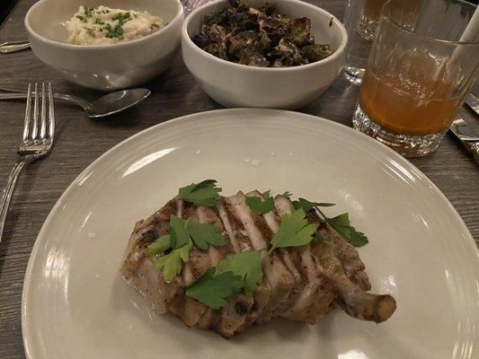 Duroc pork chop with sour cream mashed potatoes & fried brussels sprouts