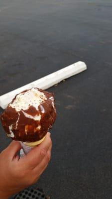 Toasted coconut ice cream with a chocolate dip.