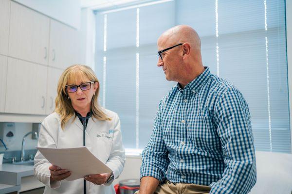 Dr. Goldbloom reviewing information with patient