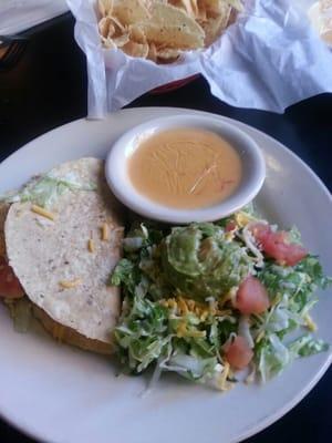 Beef taco, queso and guacamole salad. Sides to my El Mercado beef enchilada dinner.