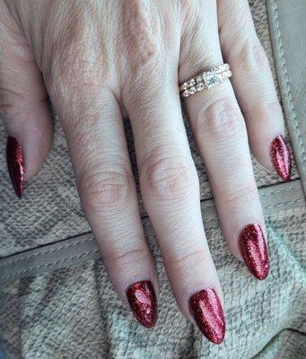 Beautiful nails done by Shawna. Morticia red with sparkle for bling.