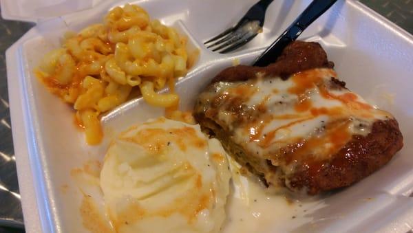 Pardon the Tabasco sauce. Country fried steak with mashed taters and mac-n-cheese. $7.50, tax included. Delicious!