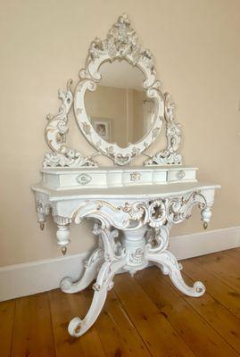 This unique Mirror stand is available for sale  Measures w48" D19" high xx  $1800