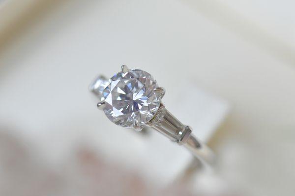 Custom round diamond engagement ring set in platinum