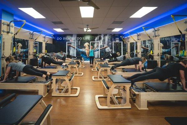 Planking at Club Pilates.