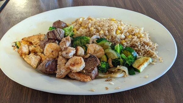 Hibachi Grill with chicken, steak, shrimp and very little soy sauce.