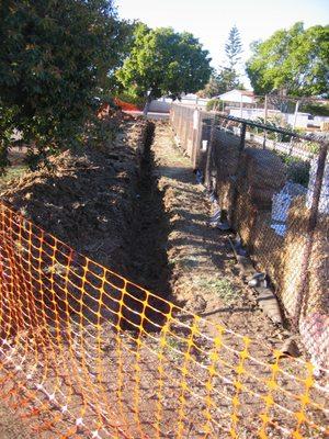 This is part of the trench that we needed to fill after installing root barrier