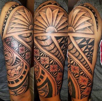 Half sleeve Tribal tattoo