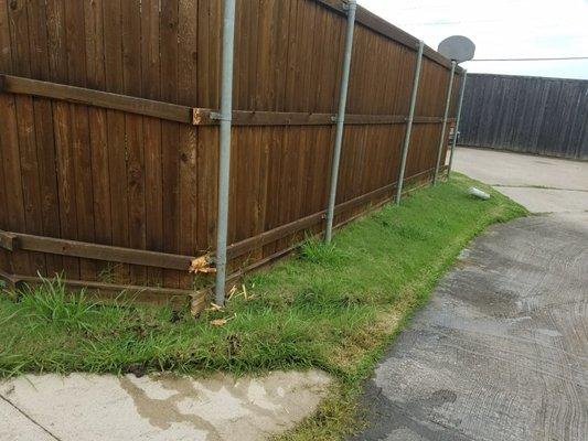 Fence damaged by mover driving moving truck