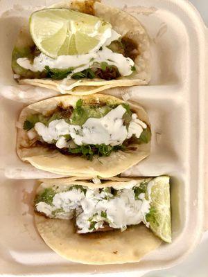 Barbacoa Tacos with guacamole salsa and sour cream