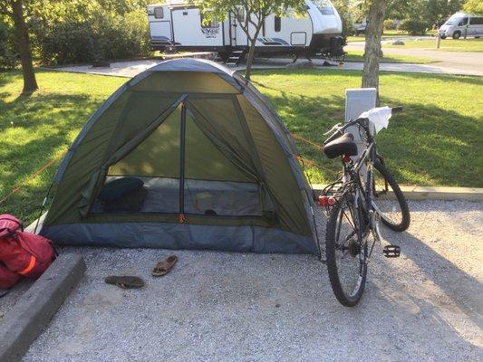 You must pitch your tent on the gravel pad.