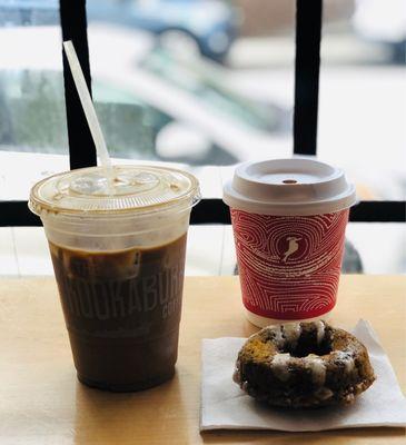 Mocha nut, honey badger, and pumpkin donut. (Couldn't resist a sip from my cold brew!)