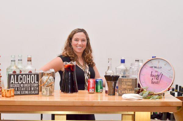 Trissa being adorable at my wedding with a great bar set up & a contagious smile ready to tend to us all.