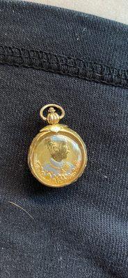 AFTER: 20+ year old pendant from Thailand that Don fixed and polished clean.