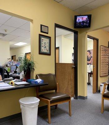 A small TV entertains the waiting room