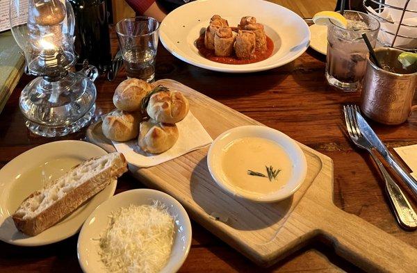 Pretzel rolls with provolone dip; Italian spring rolls