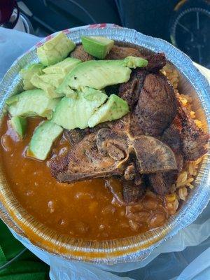 Fried pork chop rice beans and avocado