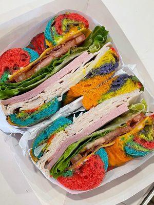 Club sandwich on a rainbow bagel